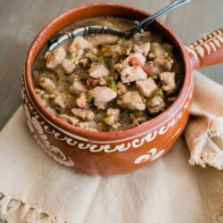 Pork green chile served in an authentic bowl