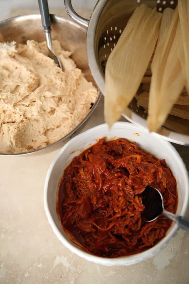 masa for tamales and red Chile and pork with husks