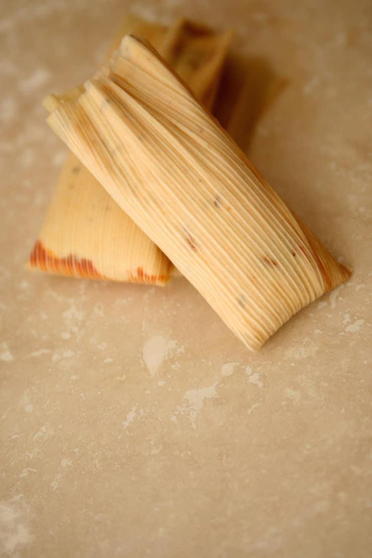 How to make Tamal Dough (Masa para Tamales) two uncooked tamales