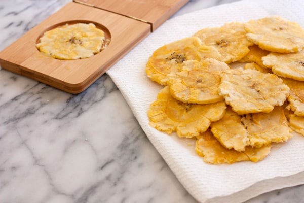 Yummy tostones in the process of making