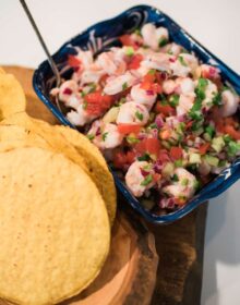 ceviche in a bowl and tostadas on the side for a tostada bar