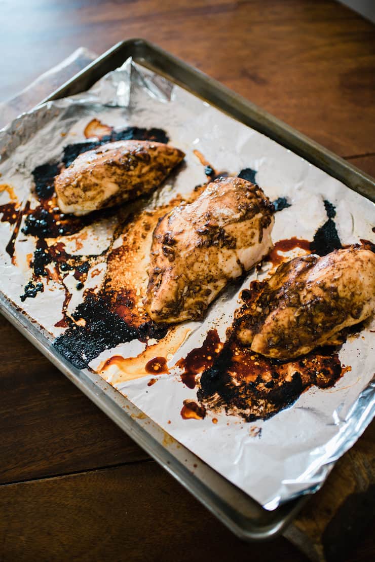 oven baked chicken breasts on foil lined sheet pan