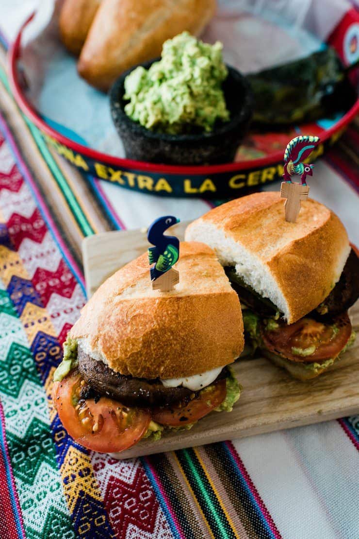 sliced mushroom torta sandwich with Mexican carved toothpicks