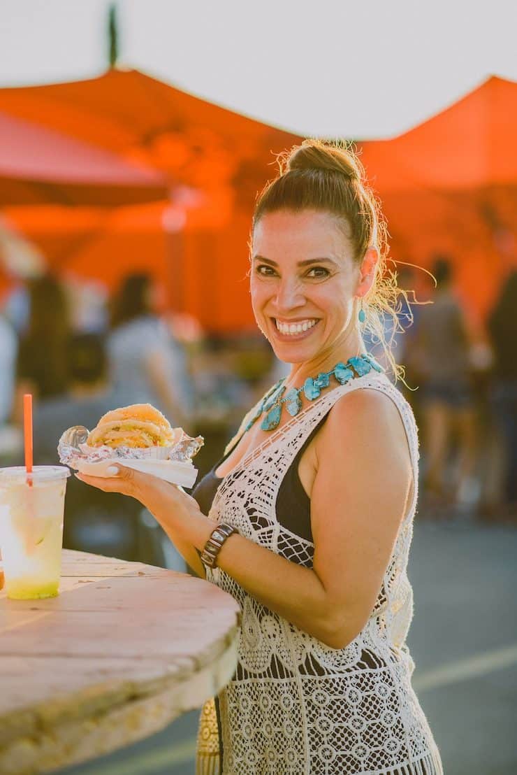 Yvette Marquez food blogger with an order of Gorditas at Ysleta mission festival