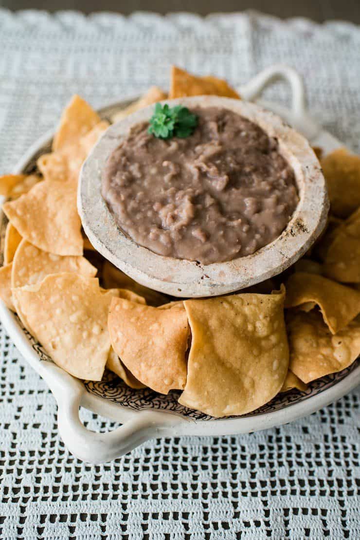 refried beans served as a bean dip with tortilla chips