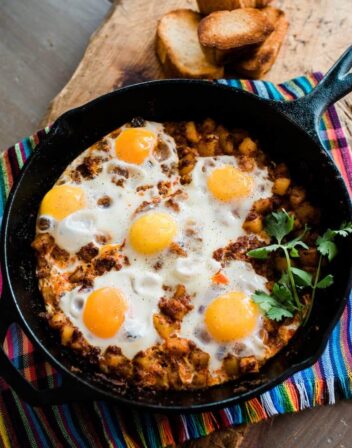 overhead shot of a breakfast egg skillet with chorizo and potaoes