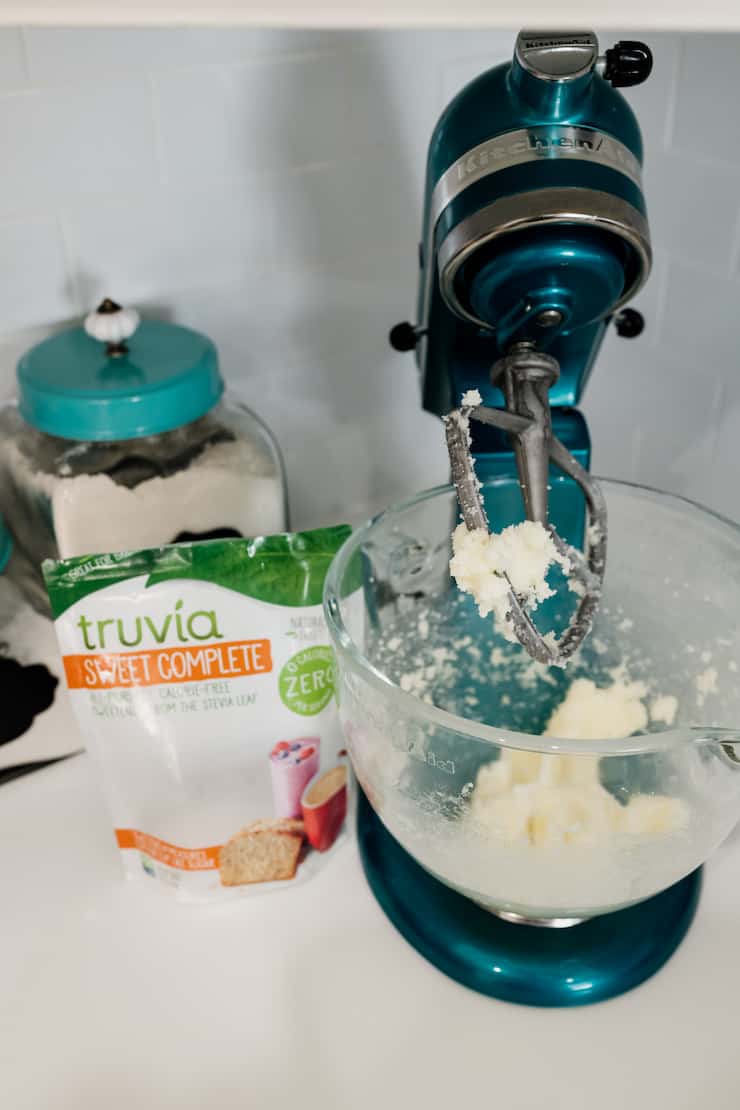 creaming butter and truvia together in a turquoise kitchenaid maker.