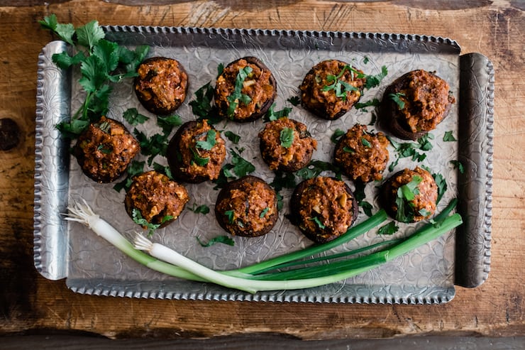 silver tray displaying stuffed mushrooms for a party appetizer 
