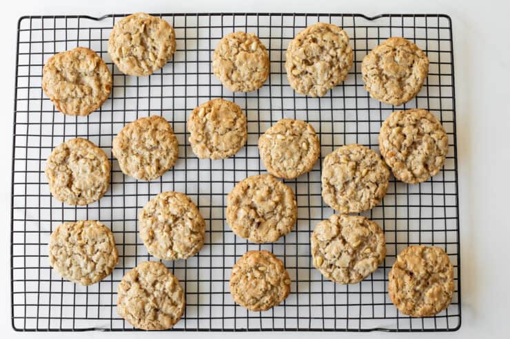 Brown Butter Oatmeal Pine Nut Cookies on a cooling rack