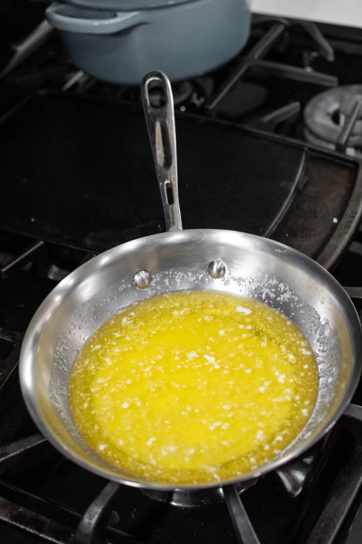 making brown butter in a skillet on stovetop