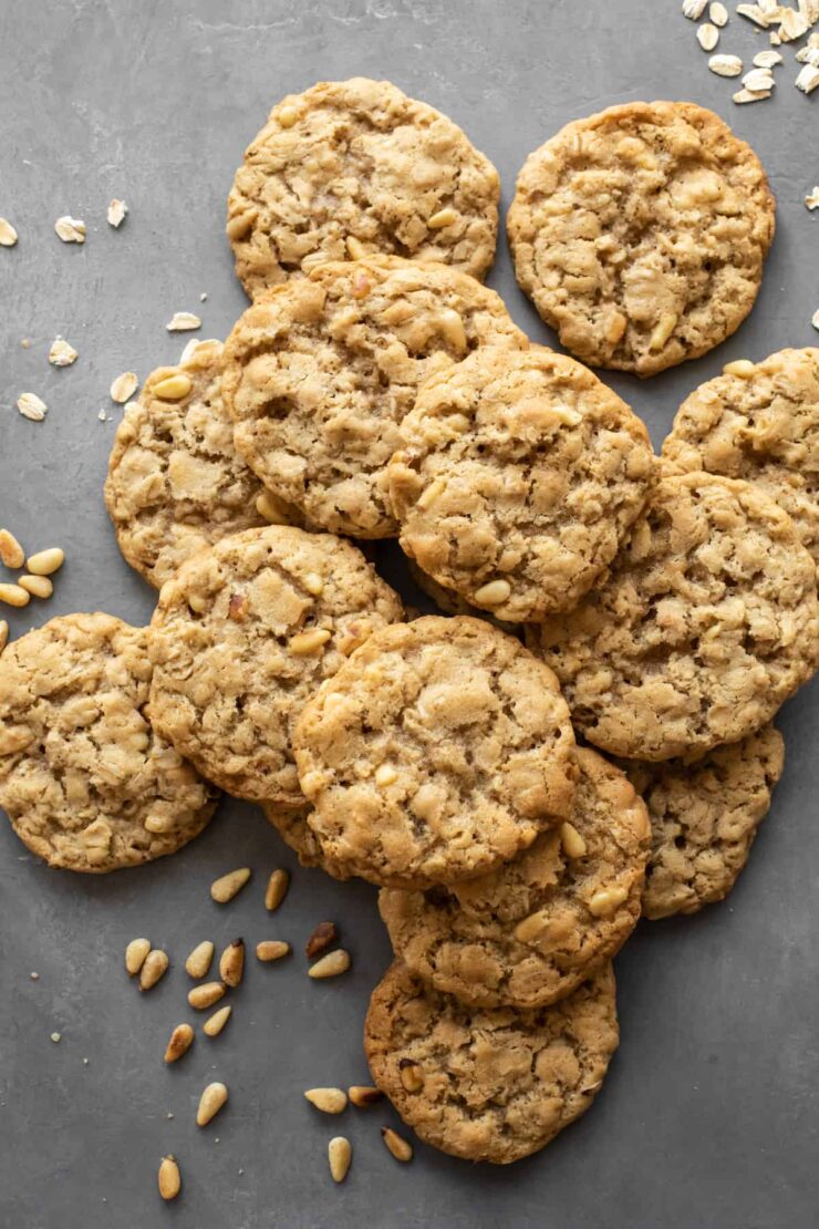 pinon oatmeal cookies on a dark gray surface