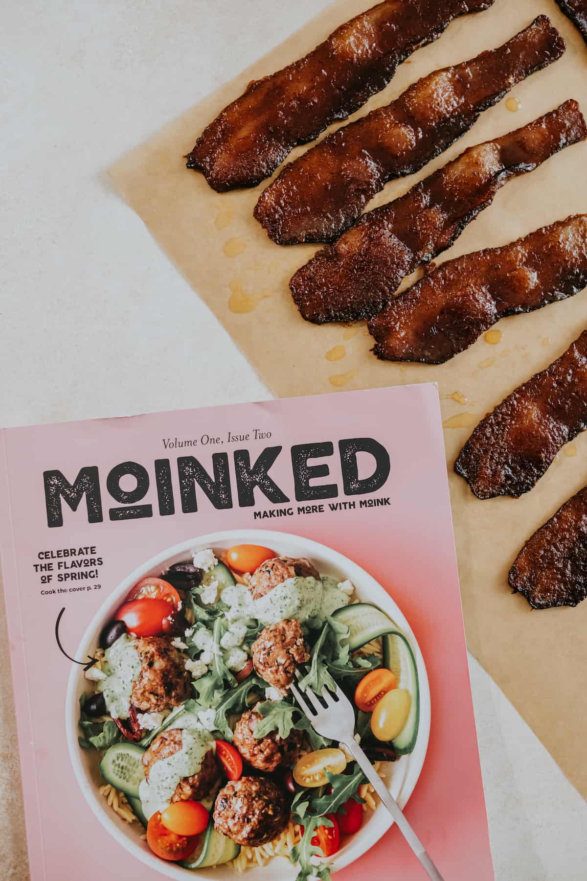 pig candy on parchment paper with a catalog of Moinked