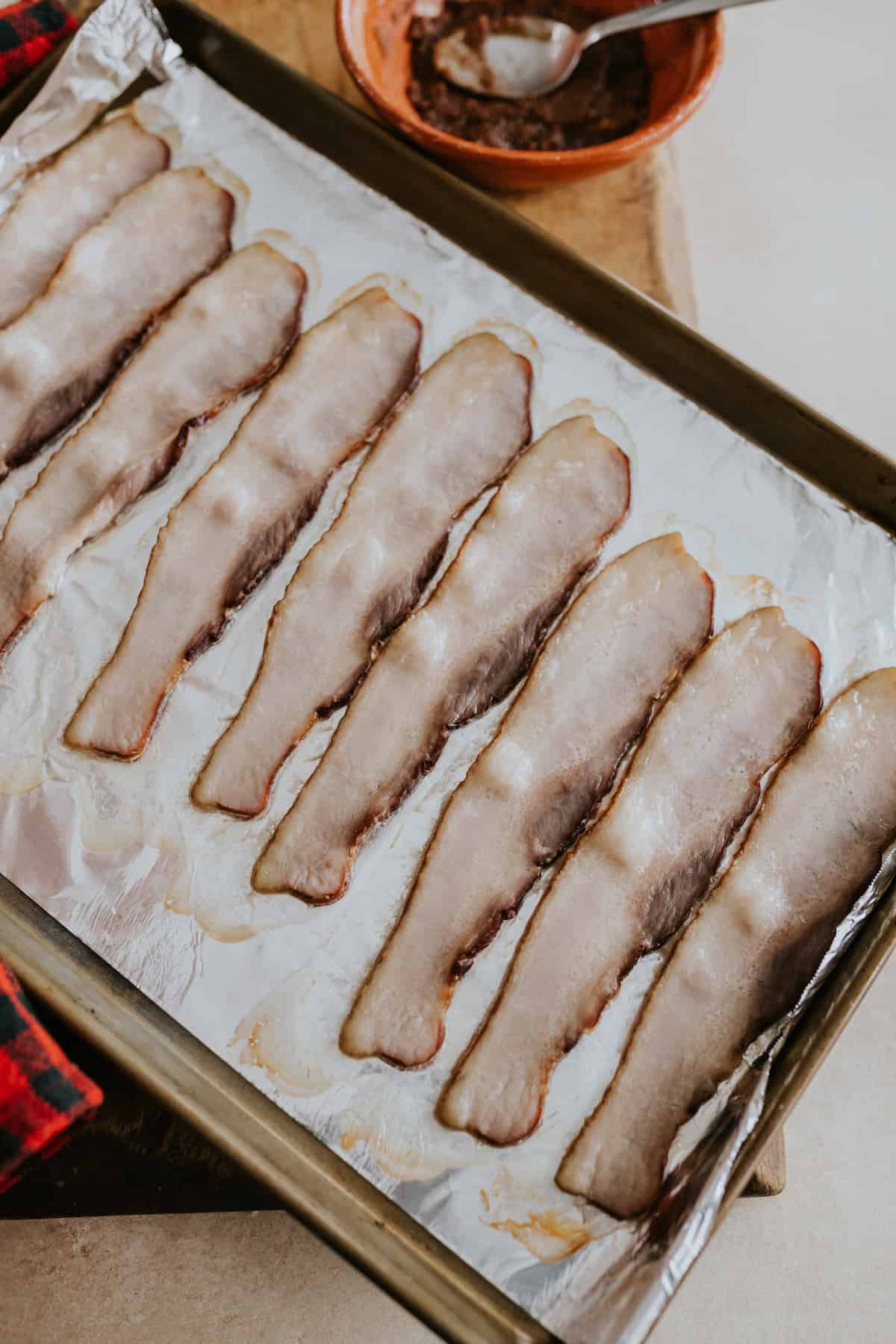 bacon on a foil lined baking sheet
