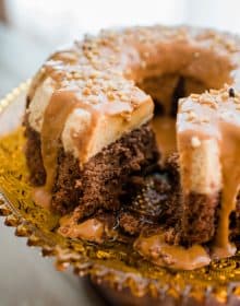 Chocoflan sliced with dulce de Leche and pecans.
