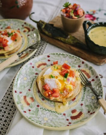 chile verde eggs benedict served with homemade chile hollandaise