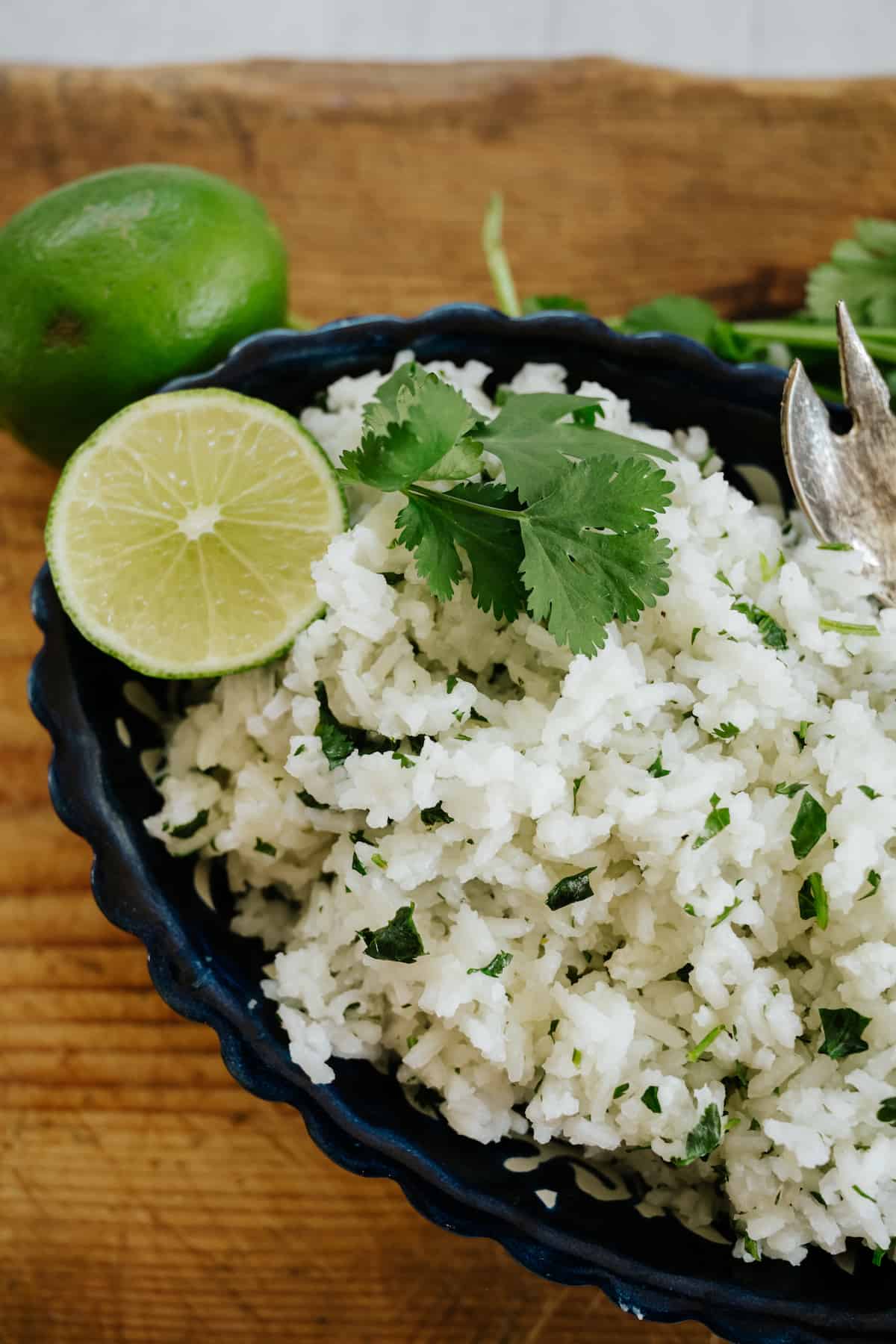 black fluted bowl filled with better-than-Chipotle cilantro lime rice.
